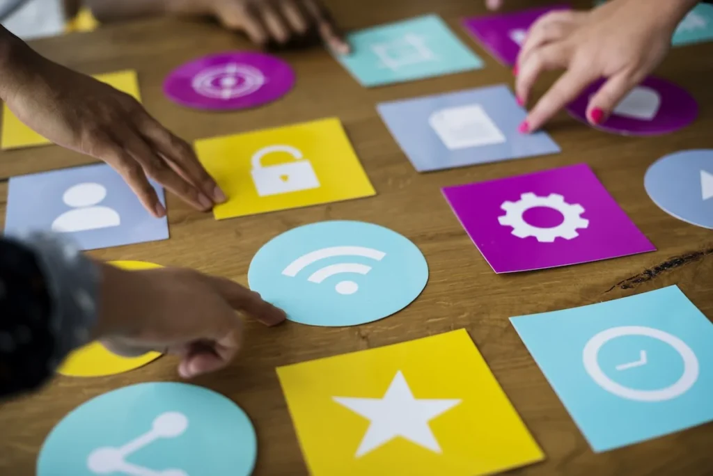 computer icons on the wooden table